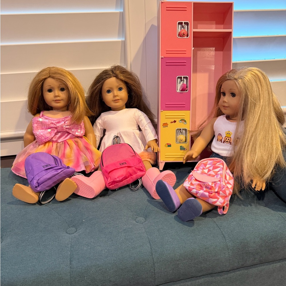American Girl Doll Trio with Pink and Purple Accessories
